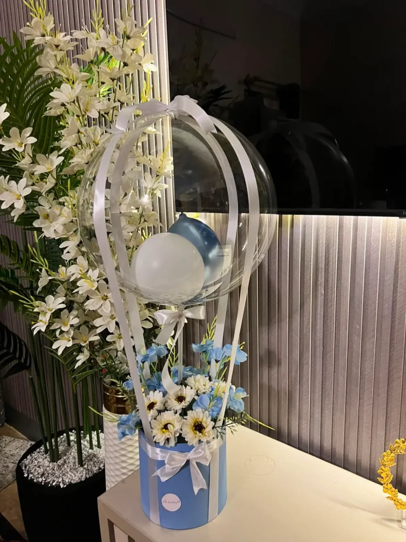 WhatsApp Image 2026-07-12 at 3.07.15 PM (1) The Enchanted Hot Air Balloon Floral Box (Blue & White)