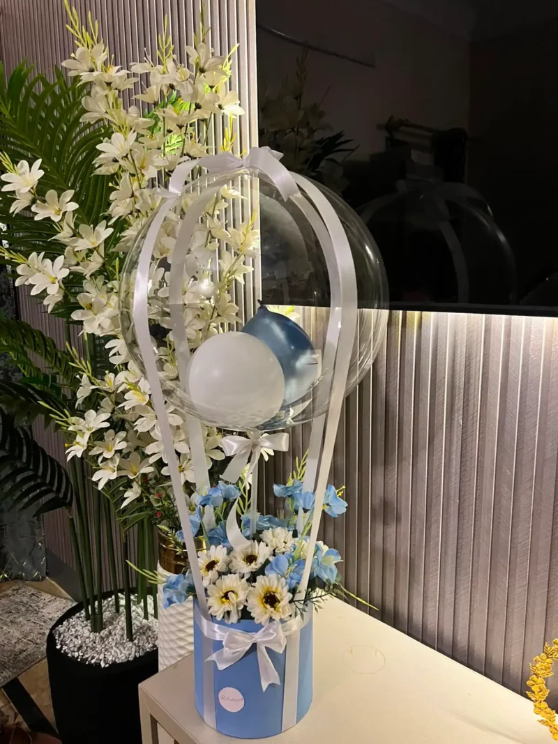 WhatsApp Image 2026-07-12 at 3.07.15 PM The Enchanted Hot Air Balloon Floral Box (Blue & White)